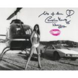 Caroline Munro signed and kissed 10x8 black and white photograph pictured during her role as Naomi