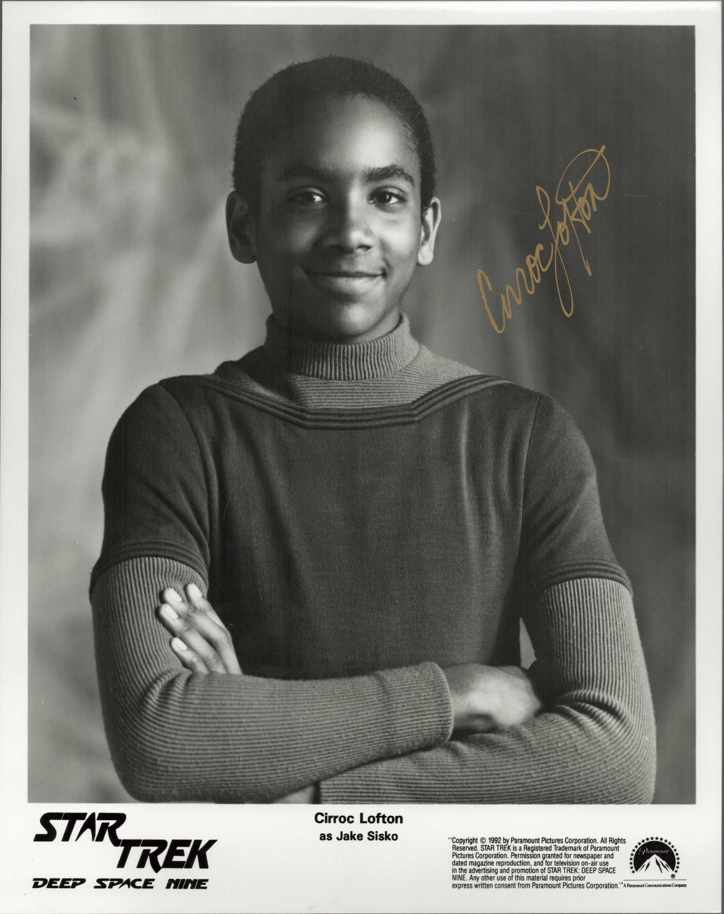 Star Trek Actor, Cirroc Lofton signed black and white promo photograph. Signed in golden ink, this