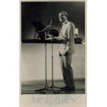 Roy Castle signed 6x4 black and white photo attached to paper overall size 7x5. Castle OBE was an