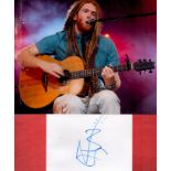 Newton Faulkner signature piece featuring a 10x8 colour photograph and a signed white card. All