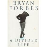 Bryan Forbes signed book A Divided Life. Fair Condition Overall. All autographs come with a