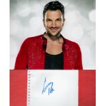 Peter Andre signature piece featuring a 10x8 colour photograph and a signed white card. Andre gained