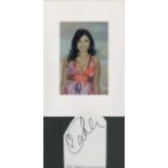 Rachel Grant signature piece featuring a signed white card cutting and a colour photo. Rachel Louise