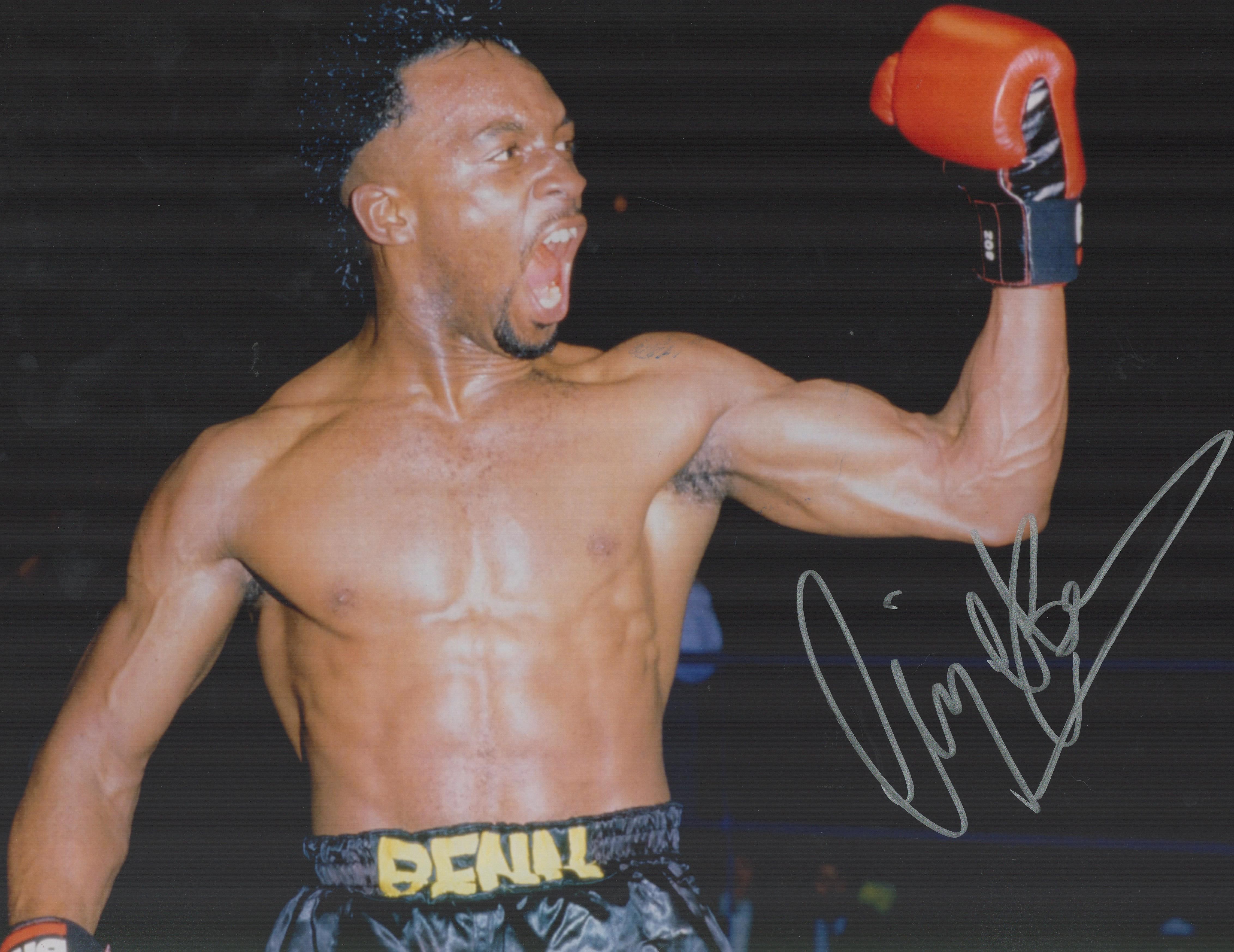 Boxing Nigel Benn signed 16x12 colour photo. Good condition. All autographs come with a