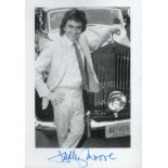 Dudley Moore signed 7 x 5 inch b/w photo from Arthur. Marks on back where removed from album,