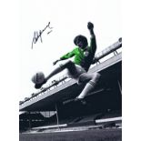 Autographed STEVE HEIGHWAY 16 x 12 photo - Colorized, depicting the Ireland winger striking a