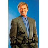 Tommy Steele signed 6 x 4 inch colour photo. Good condition. All autographs come with a