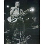 Peter Hook signed 10x8 black and white photo. Good condition. All autographs come with a Certificate