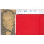 Astronaut John Glenn signed small signature piece fixed to b/w newspaper photo. Good condition.