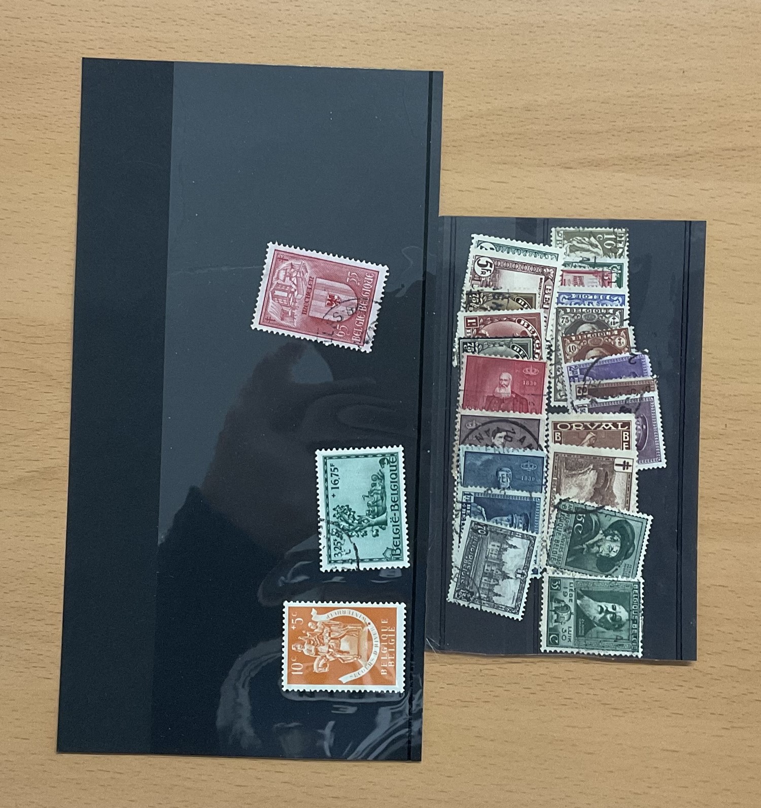 Belgium stamps 2 stockcards and 1 small packet of stamps. We combine postage on multiple winning