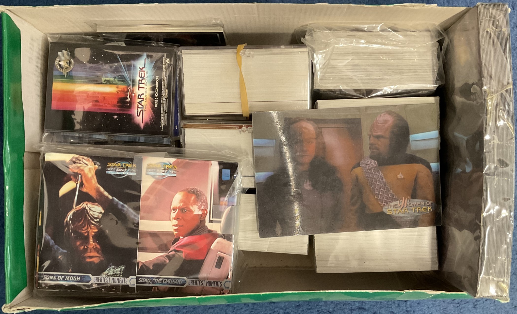 Box of Star Trek trading cards some in original packets not opened, 100 plus in each packet 10 big