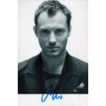 Jude Law signed 6 x 4 inch b/w photo. Good condition. All autographs come with a Certificate of