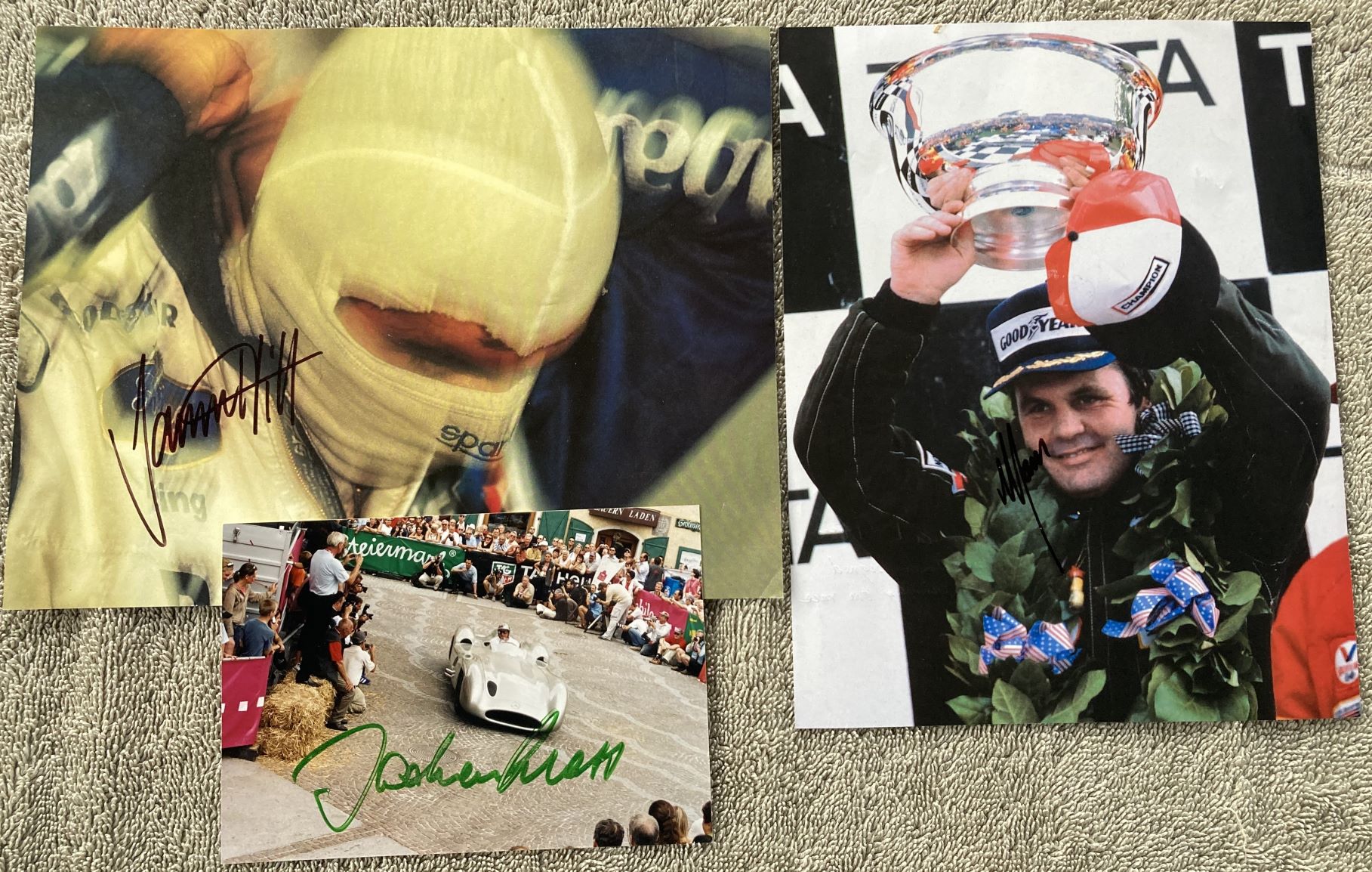 Motor Racing collection of two 8 x 6 magazine photos signed by Damon Hill and Alan Jones PLUS 6 x4