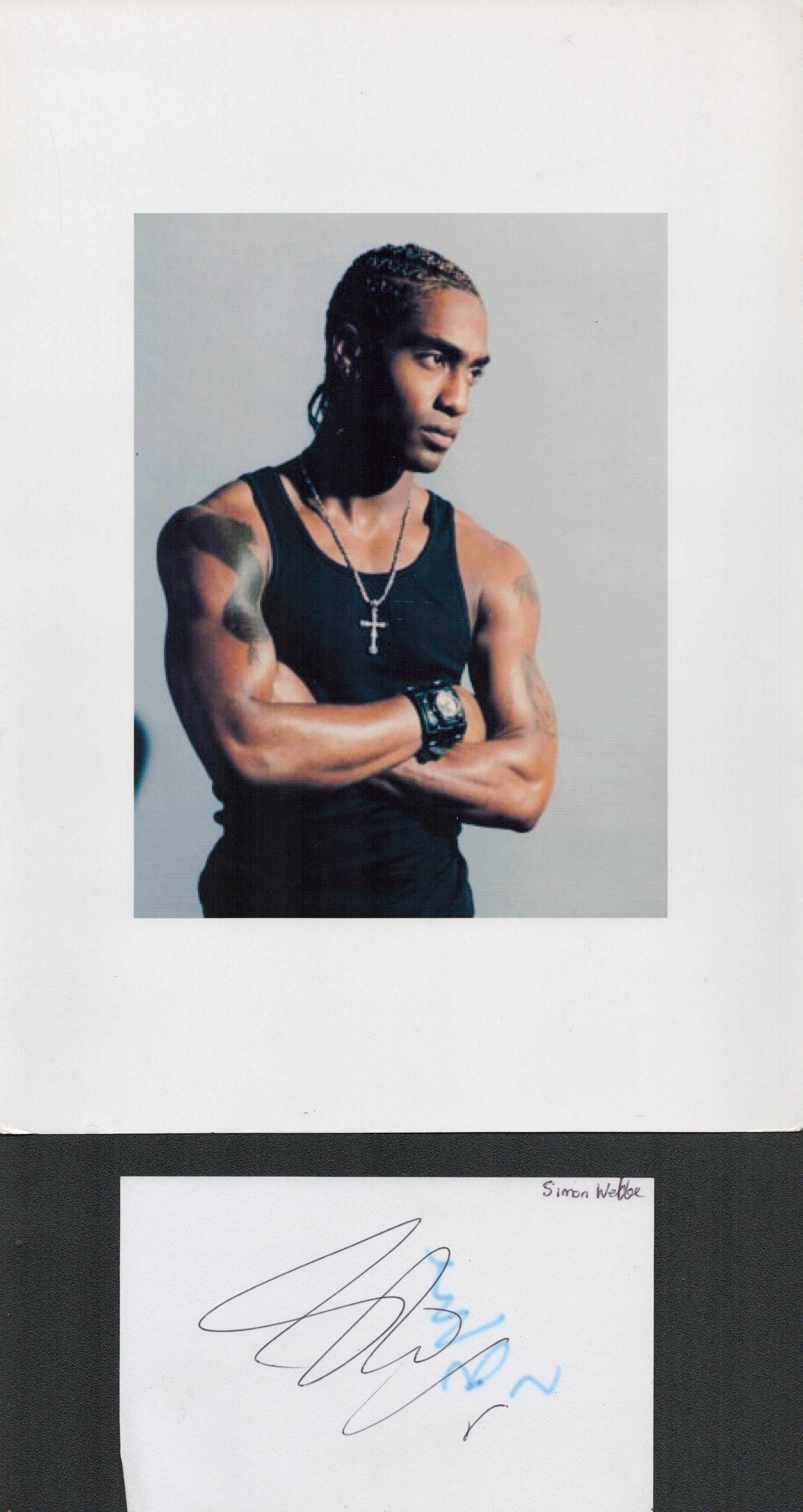 Simon Webbe signature piece featuring a colour photograph and a signed white card. The colour