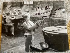 Oliver actor Mark Lester signed 10 x 8 inch b/w photo with classic quote Please Sir I want some