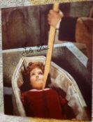 Hammer Horror Isla Blair signed 10 x 8 inch colour photo in coffin. Good Condition. All autographs