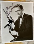 Robert Vaughn signed 10 x 8 inch b/w photo from Man from Uncle. was an American actor noted for