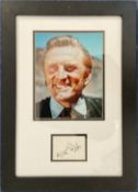 Framed Kirk Douglas 21x15 mounted and framed signature display includes a signed album page and a