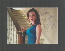 Daisy Lewis 10x8 mounted signature piece. Good condition. All autographs come with a Certificate