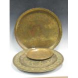A collection of Indian brass circular trays