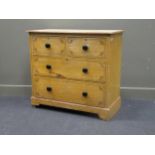 A painted pine chest of two short over two long drawers rasied on bracket feet 90 x 99 x 48cm (later