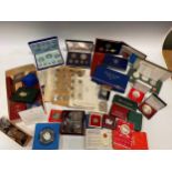 A large collection of coins, mainly 20th century, to include five albums containing presentation