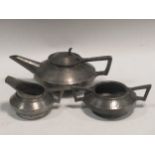 An Art Deco style pewter three-piece tea tea set