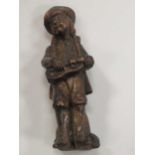 A carved oak figure of a hurdy-gurdy player, 19th century, 20cm high