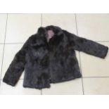 A waist length mink fur coat, size 14