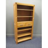 A modern oak open bookcase with two central drawers, 197 x 100 x 35 cm, a matching 3 drawer