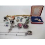 A collection of assorted base metal and silver jewellery, together with a platinum medallion