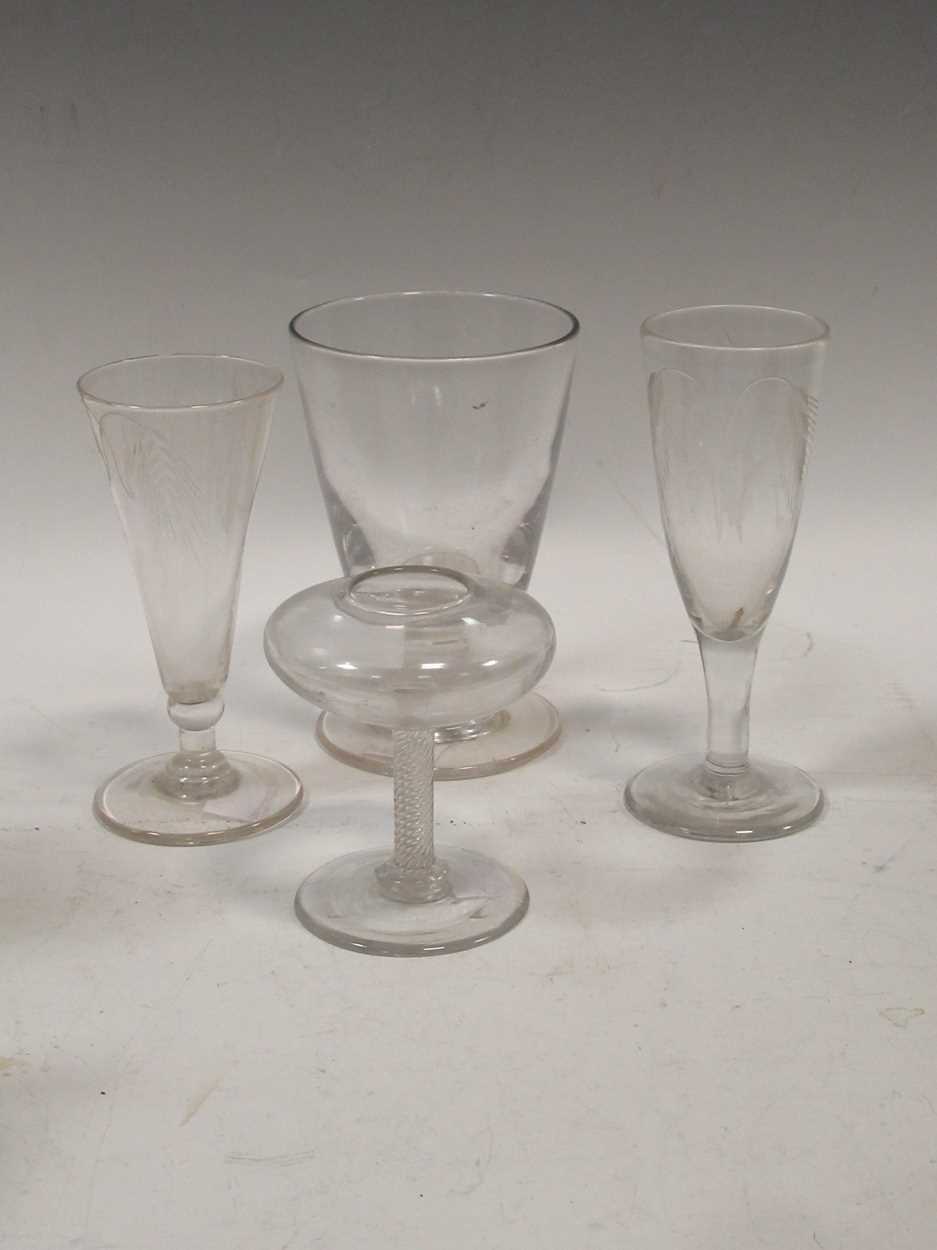 A late 18th or early 19th century glass lace makers lamp, together with two ale glasses and a