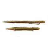 Two 9ct gold propelling pencils, one 22.6g gross, the other 21g gross (2)Provenance:Property from