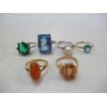 A group of gemset rings, a synthetic spinel ring, tested as platinum, a pearl ring, tested as