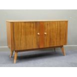 A mid-century walnut veneer sideboard, 89 x 138 x 46 cm, and chest of drawers, 86 x 78 x 46 cm (2)