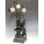 A modern spelter figural table lamp of a classical maiden bathing in a fountain, with floral