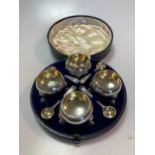 A cased set of 4 Victorian cauldron salts, with four matched spoons 5.5ozt gross