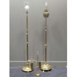 Two late Victorian/Edwardian adjustable brass standard lamps, largest 169cm high, (both converted to