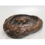 A carved wood Japanese dish of a crab in a gourd, Meji period (1850-1880)27 x 20cmCondition