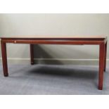 A Chinese hardwood dining table, 20th century, with fixed top, on traditional shape legs, 76 x 83