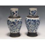 A pair of Chinese blue and white vases decorated with dragons and foliate, 39 cm highCondition