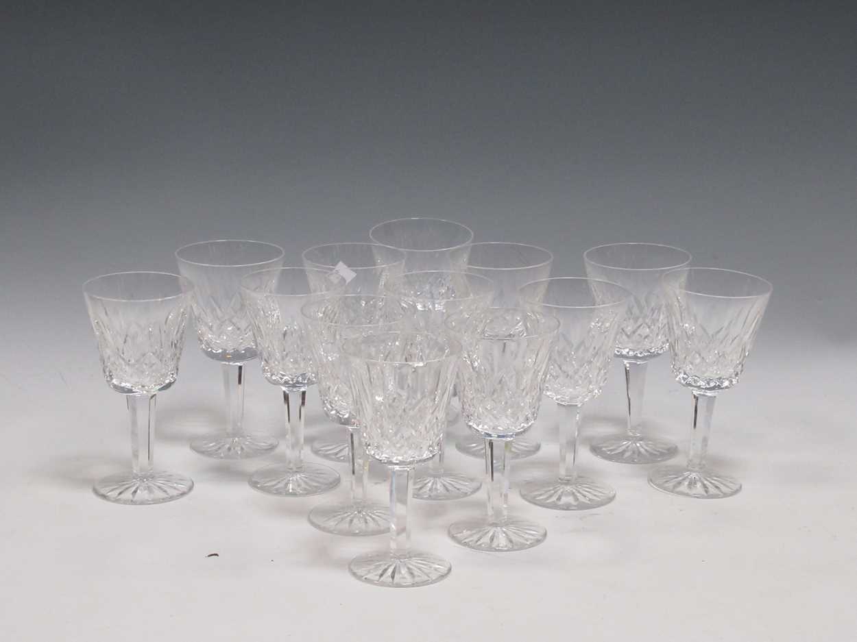 A set of thirteen Waterford Crystal wine glassesCondition report: Minor chipping and surface