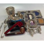 A cased set of 6 silver teaspoons, together with a silver caster, a silver sugar basket frame, a