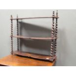 A Victorian walnut three tier wall shelf with turned barley twist supports , 57 x 63 x 15cm