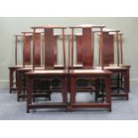 A set of eight 20th century Chinese hardwood dining chairs of traditional design with cane top seats