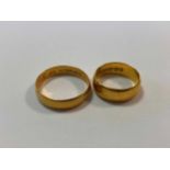 two hallmarked 22ct gold wedding bands, gross weight 9.8g (2)