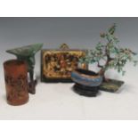 A reproduction Chinese archaic style tripod cup, a modern simulated bonzai tree with enameled stand,