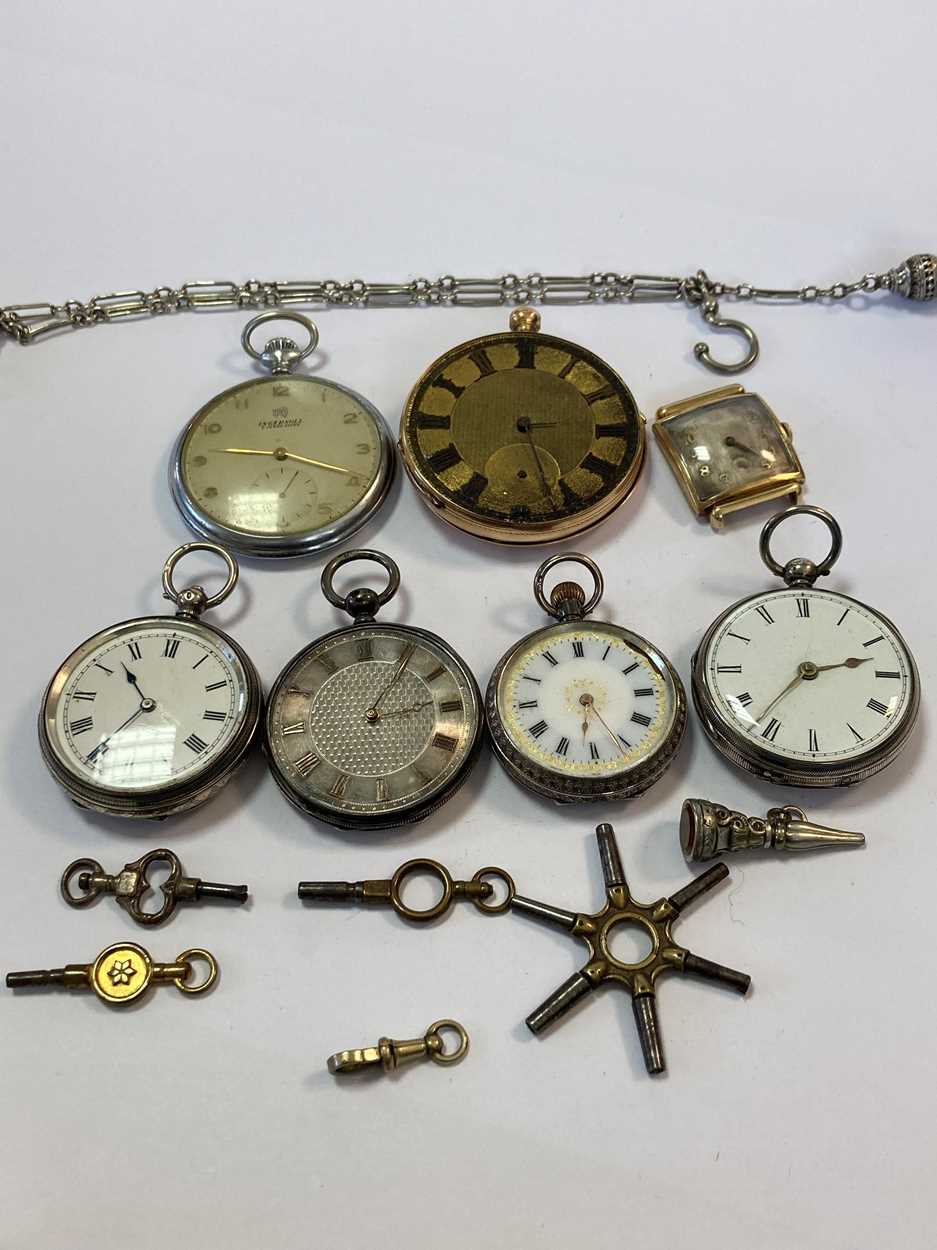 A collectin of pocket watches including one stamped 'K14', a watch head ...