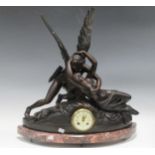 A 19th Century French figural mantel clock with Cupid and Psyche above an enclosed drum