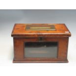 A rectangular pine mailing box, the hinged top with brass mounted "LETTERS" slot and glazed front